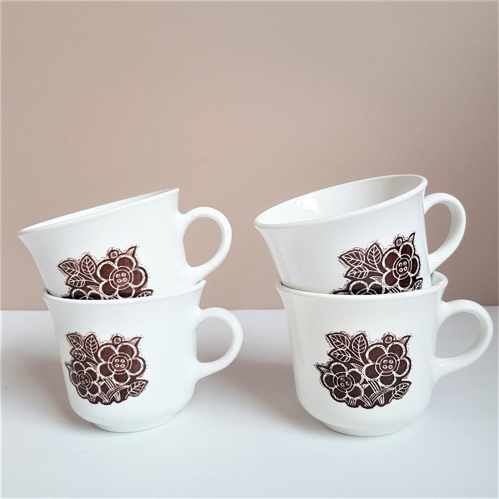 4 Vintage Corelle by Corning small coffee mugs.